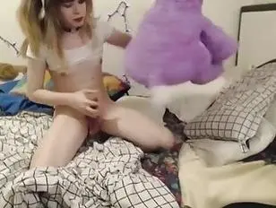 Cute tranny in pigtails humping her plushie